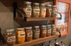 This image shows an heirloom spice rack made with mason jars in a kitchen in Allison Park, Pa. When you live in a multigenerational house, deep-time design opportunities lurk around every corner. Opportunities to blend past and present abound. (AP Photo/Ted Anthony)