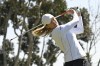 Maude-Aimee Leblanc, of Canada, hits her tee shot on the first hole during the final round of the JTBC LPGA golf tournament, Sunday, March 27, 2022, in Carlsbad, Calif. Working smarter, not harder, especially on the green, has made all the difference for Canada's Maude-Aimee Leblanc. (AP Photo/Denis Poroy)
