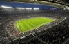 FILE - Spectators crowd the Camp Nou stadium during the Women's Champions League quarterfinal, second leg soccer match between Barcelona and Real Madrid in Barcelona, Spain, Wednesday, March 30, 2022. Barcelona will play the 2023-24 season away from Camp Nou while Europe’s largest soccer stadium undergoes a massive overhaul, the Spanish club said Thursday, April 28, 2022. (AP Photo/Maria Angela Angles, File)