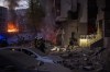 Emergency services respond in the area following an explosion in Kyiv, Ukraine on Thursday, April 28, 2022. Russia struck the Ukrainian capital of Kyiv shortly after a meeting between President Volodymyr Zelenskyy and U.N. Secretary-General António Guterres on Thursday evening. (AP Photo/Emilio Morenatti)
