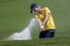 FILE - Kerrie Webb hits from the sand on the ninth hole during the final round of the LPGA North Texas Shootout golf tournament on May 3, 2015, in Irving, Texas. The men's and women's Australian Open golf tournaments are set to be played at the same time on two sandbelt courses in southeast Melbourne in December Golf Australia said Friday, April 29, 2022. Five-time winner Karrie Webb says she might even come out of semi-retirement to play in it. (AP Photo/LM Otero, File)