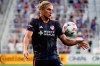FC Cincinnati defender Nick Hagglund (14) chests the ball during the first half of an MLS soccer match against CF Montréal Wednesday, Aug. 18, 2021, in Cincinnati. A fan favourite from his days with Toronto FC, defender Nick Hagglund returns to BMO Field on Saturday with FC Cincinnati, his hometown club. (AP Photo/Jeff Dean)