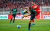 Berlin's Niko Giesselmann, right, fights for the ball with Fuerth's Simon Asta during the German Bundesliga soccer match between 1. FC Union Berlin and SpVgg Greuther Fuerth in Berlin, Friday, April 29, 2022. (Andreas Gora/dpa via AP)