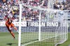 Verona goalkeeper Lorenzo Montipo fails to save a free-kick by Cagliari's Joao Pedro during the Serie A soccer match between Cagliari and Hellas Verona, at the Sardegna stadium in Cagliari, Italy, Saturday, April 30, 2022. (Alessandro Tocco/LaPresse via AP)