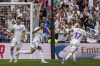 Real Madrid's Rodrygo, center, celebrates after scoring his second goal against Espanyol during La Liga soccer match at the Santiago Bernabeu stadium in Madrid, Saturday, April 30, 2022. (AP Photo/Bernat Armangue)