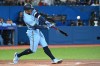 Toronto Blue Jays' George Springer hits a solo home run in the first inning of an American League baseball game against the Houston Astros in Toronto, Saturday, April 30, 2022. THE CANADIAN PRESS/Jon Blacker