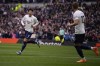 Tottenham's Son Heung-min, left, celebrates scoring his side's second goal during the English Premier League soccer match between Tottenham Hotspur and Leicester City at Tottenham Hotspur stadium in London, England, Sunday, May 1, 2022. (AP Photo/Matt Dunham)
