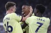 Arsenal's Gabriel, centre celebrates after scoring his sides second goal of the game during the English Premier League soccer match between West Ham United and Arsenal at the London stadium in London, Sunday, May 1, 2022. (AP Photo/Ian Walton)