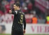 Bayern's Robert Lewandowski after scoring his sides first goal during a German Bundesliga soccer match between FSV Mainz 05 and Bayern Munich in Mainz, Germany, Saturday, April 30, 2022. Lewandowski set a new record for most single-season away goals. (AP Photo/Michael Probst)
