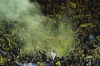 Villarreal fans cheer for their team at the end of the Champions League semi final, first leg soccer match between Liverpool and Villarreal at Anfield stadium in Liverpool, England, Wednesday, April 27, 2022. (AP Photo/Jon Super)