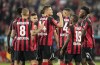 Leverkusen's Patrik Schick, center, celebrates after he scored his side's second goal during the German Bundesliga soccer match between Bayer Leverkusen and Eintracht Frankfurt in Leverkusen, Germany, Monday, May 2, 2022. (AP Photo/Martin Meissner)