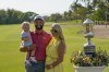 Jon Rahm, of Spain, poses for photos with his wife Kelley Cahill and his son Kepa, after winning the Mexico Open at Vidanta, in Puerto Vallarta, Mexico, Sunday, May 1, 2022. (AP Photo/Eduardo Verdugo)