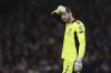 FILE - Scotland's goalkeeper Craig Gordon gestures during the World Cup 2022 group F qualifying soccer match between Scotland and Denmark at Hampden Park stadium in Glasgow, Scotland, Monday, Nov. 15, 2021. The 39-year-old goalkeeper Craig Gordon has been voted by journalists player of the year in Scotland for a record third time on Wednesday, May 4, 2022. (AP Photo/Scott Heppell, File)