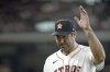 Houston Astros starting pitcher Justin Verlander acknowledges the crowd as he leaves the field during the seventh inning of a baseball game against the Seattle Mariners Wednesday, May 4, 2022, in Houston. (AP Photo/David J. Phillip)