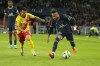 PSG's Neymar, right, and Lens' Corentin Jean challenge during the French League One soccer match between Paris Saint Germain and Lens at Parc des Princes stadium in Paris, Saturday, April 23, 2022. (AP Photo/Michel Euler)