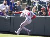 Washington Nationals left fielder Dee Strange-Gordon misses a pop foul off the bat of Colorado Rockies' Garrett Hampson in the sixth inning of a baseball game Thursday, May 5, 2022, in Denver. (AP Photo/David Zalubowski)