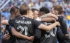 CF Montreal players celebrate a goal by teammate Djordje Mihailovic against the Vancouver Whitecaps during first half MLS soccer action in Montreal, Saturday, April 16, 2022.&nbsp;CF Montreal extended its Major League Soccer unbeaten run to six games following a dramatic win over Atlanta United last week. THE CANADIAN PRESS/Graham Hughes
