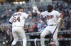 Minnesota Twins' Jose Miranda (64) high-fives Royce Lewis (23) after Miranda hit a home run during the second inning of the team's baseball game against the Oakland Athletics, Friday, May 6, 2022, in Minneapolis. (AP Photo/Stacy Bengs)