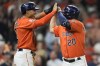 Houston Astros' Chas McCormick (20) celebrates his two-run home run with Jeremy Pena during the second inning of the team's baseball game against the Detroit Tigers, Friday, May 6, 2022, in Houston. (AP Photo/Eric Christian Smith)