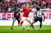 Union Berlin's Sheraldo Becker, left, in action with Freiburg's Nico Schlotterbeck center during a German Bundesliga soccer match between SC Freiburg and Union Berlin in Freiburg, Germany, Saturday, May 7, 2022. a(Tom Weller/dpa via AP)