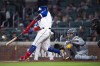 Atlanta Braves' Ronald Acuna Jr. hits a solo home run in the fifth inning of the team's baseball game against the Milwaukee Brewers on Saturday, May 7, 2022, in Atlanta. (AP Photo/Hakim Wright Sr)