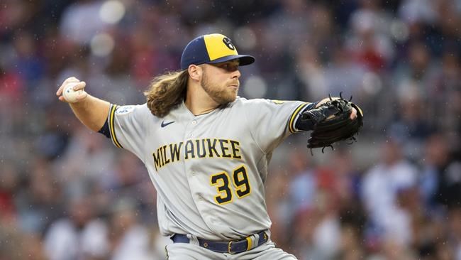 Milwaukee Brewers starting pitcher Corbin Burnes (39) works the first inning of a baseball game against the Atlanta Braves, Saturday, May 7, 2022, in Atlanta. (AP Photo/Hakim Wright Sr)