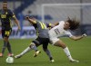 Marseille's Matteo Guendouzi, right, duels for the ball with Feyenoord's Bryan Linssen during the Europa Conference League semi final, second leg soccer match between Olympique Marseille and Feyenoord at the Velodrome stadium in Marseille, southern France, Thursday, May 5, 2022. (AP Photo/Daniel Cole)