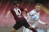 Salernitana's Simone Verdi, left, and Cagliari's Marko Rog vie for the ball during the Italian Serie A soccer match between Salernitana and Cagliari, at the Arechi stadium in Salerno, Italy, Sunday, May 8, 2022. (Alessandro Garofalo/LaPresse via AP)