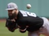 Chicago White Sox starting pitcher Dallas Keuchel (60) follows through on a pitch during the first inning of a baseball game against the Boston Red Sox at Fenway Park, Sunday, May 8, 2022, in Boston. (AP Photo/Mary Schwalm)