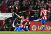 Atletico Madrid's Yannick Carrasco celebrates after scoring his side's opening goal during a Spanish La Liga soccer match between Atletico Madrid and Real Madrid at the Wanda Metropolitano stadium in Madrid, Spain, Sunday, May 8, 2022. (AP Photo/Manu Fernandez)