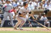 Miami Marlins' Joey Wendle watches his single against the San Diego Padres during the fourth inning of a baseball game Sunday, May 8, 2022, in San Diego. (AP Photo/Mike McGinnis)