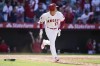 Los Angeles Angels designated hitter Shohei Ohtani (17) runs to first base on a double during the ninth inning of a baseball game against the Washington Nationals in Anaheim, Calif., Sunday, May 8, 2022. Luis Rengifo and Taylor Ward scored. (AP Photo/Ashley Landis)