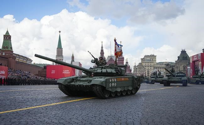 Russian tanks roll during the Victory Day military parade in Moscow, Russia, Monday, May 9, 2022, marking the 77th anniversary of the end of World War II. (AP Photo/Alexander Zemlianichenko)