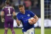Schalke's Simon Terodde celebrates after he scored a penalty goal during the 2nd Bundesliga soccer match between FC Schalke 04 and FC St. Pauli at the Arena in Gelsenkirchen, Germany, Saturday, May 7, 2022. Traditional club FC Schalke 04 can secure an immediate return to the German top league Bundesliga with a win over St. Pauli. (AP Photo/Martin Meissner)
