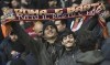 Roma fans cheer for their team ahead the Europa Conference League semi final match between Leicester City and Roma at the King Power Stadium in Leicester, England, Thursday, April 28, 2022. (AP Photo/Rui Vieira)