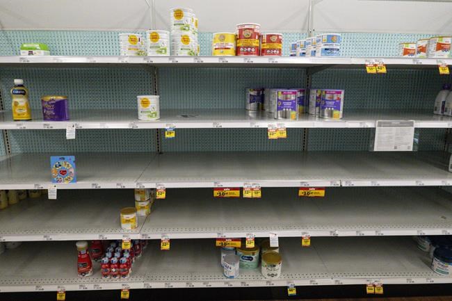 Baby formula is displayed on the shelves of a grocery store in Carmel, Ind., Tuesday, May 10, 2022. Parents across the U.S. are scrambling to find baby formula because supply disruptions and a massive safety recall have swept many leading brands off store shelves. THE CANADIAN PRESS/AP-Michael Conroy