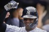 New York Yankees' Gleyber Torres celebrates in the dugout after hitting a three-run home run off Toronto Blue Jays starting pitcher Jose Berrios (17) in the fourth inning of a baseball game, Wednesday, May 11, 2022, in New York. (AP Photo/John Minchillo)