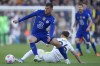 Leeds United's Lewis Bate, right, challenges Chelsea's Mason Mount during the English Premier League soccer match between Leeds United and Chelsea at Elland Road in Leeds, England, Wednesday May 11, 2022. (AP Photo/Jon Super)