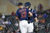 Minnesota Twins catcher Gary Sanchez, right, talks with pitcher Chris Archer after Archer walked Houston Astros' Kyle Tucker and loaded the basses during the third inning of a baseball game, Wednesday, May 11, 2022, in Minneapolis. (AP Photo/Craig Lassig)
