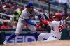 New York Mets third baseman Luis Guillorme, left, makes the tag on Washington Nationals' Juan Soto on the fielder's choice during the fourth inning of a baseball game at Nationals Park, Thursday, May 12, 2022, in Washington. (AP Photo/Alex Brandon)