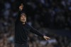 Tottenham's head coach Antonio Conte reacts during the English Premier League soccer match between Tottenham Hotspur and Arsenal at Tottenham Hotspur stadium in London, England, Thursday, May 12, 2022. (AP Photo/Matt Dunham)