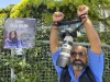 Ibrahim Almasri, an Egyptian freelance photographer, wraps his camera straps around his wrists like handcuffs during a protest as dozens of pro-Palestinian demonstrators gathered near the Israeli Consulate in Istanbul, Turkey, Thursday, May 12, 2022 to denounce the death of Al Jazeera journalist Shireen Abu Akleh. Akleh, a Palestinian-American reporter who covered the Mideast conflict for more than 25 years, was shot dead Wednesday during an Israeli military raid in the West Bank town of Jenin. Journalists who were with her, including one who was shot and wounded, said Israeli forces fired upon them even though they were clearly identifiable as reporters. (AP Photo/Mehmet Guzel)