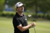 FILE - Patrick Cantlay watches his shot on the first fairway during the second round of the PGA Zurich Classic golf tournament, Friday, April 22, 2022, at TPC Louisiana in Avondale, La. (AP Photo/Gerald Herbert, File)