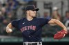 Boston Red Sox starting pitcher Nick Pivetta throws during the first inning of the team's baseball game against the Texas Rangers in Arlington, Texas, Friday, May 13, 2022. (AP Photo/LM Otero)