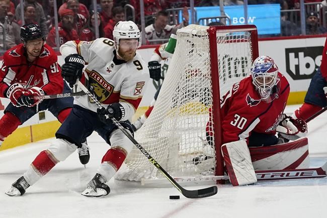 Florida Panthers center Sam Bennett (9) tries to shoot the puck with Washington Capitals goaltender Ilya Samsonov (30) defending during the second period of Game 6 in an NHL hockey Stanley Cup playoffs first-round series, Friday, May 13, 2022, in Washington. (AP Photo/Alex Brandon)