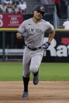 New York Yankees' Giancarlo Stanton run s the bases after hitting a two-run home run during the first inning of the team's baseball game against the Chicago White Sox in Chicago, Friday, May 13, 2022. (AP Photo/Nam Y. Huh)