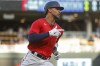 Minnesota Twins' Byron Buxton runs the bases on a solo home run against the Cleveland Guardians during the first inning of a baseball game Friday, May 13, 2022, in Minneapolis. (AP Photo/Bruce Kluckhohn)