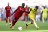 Chelsea's Jorginho, right, fights for the ball with Liverpool's Sadio Mane during the English FA Cup final soccer match between Chelsea and Liverpool, at Wembley stadium, in London, Saturday, May 14, 2022. (AP Photo/Ian Walton)
