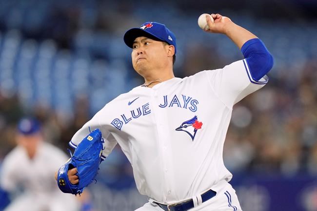 Toronto Blue Jays starting pitcher Hyun Jin Ryu (99) works against the Oakland Athletics during first inning MLB baseball action in Toronto, Saturday, April 16, 2022. The Toronto Blue Jays reinstated left-hander Hyun Jin Ryu and catcher Danny Jansen from the 10-day injured list before Saturday's road game against the Tampa Bay Rays. THE CANADIAN PRESS/Frank Gunn