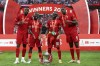 Liverpool's Divock Origi, Naby Keita, Sadio Mane and Ibrahima Konate, from left to right, pose with the trophy after wining the English FA Cup final soccer match between Chelsea and Liverpool, at Wembley stadium, in London, Saturday, May 14, 2022. Liverpool won 6-5 on penalties after the game ended in a goalless draw. (AP Photo/Ian Walton)